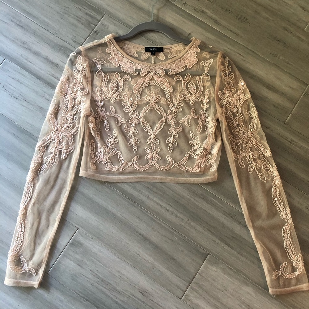 Cropped long sleeve see through shirt.